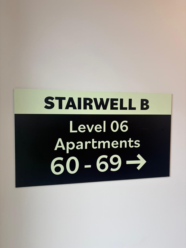An image of the Stairwell wayfinding signage for the apartments.